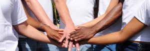 Volunteer hands in a group