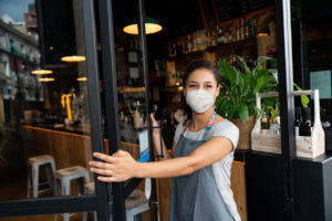 Female Business Owner with Mask On