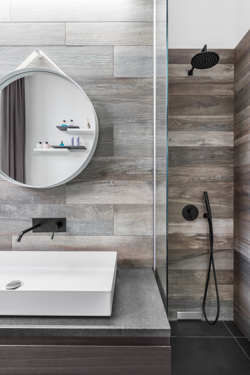 Bathroom With Shower Modern bathroom with shower and wood effect tiling