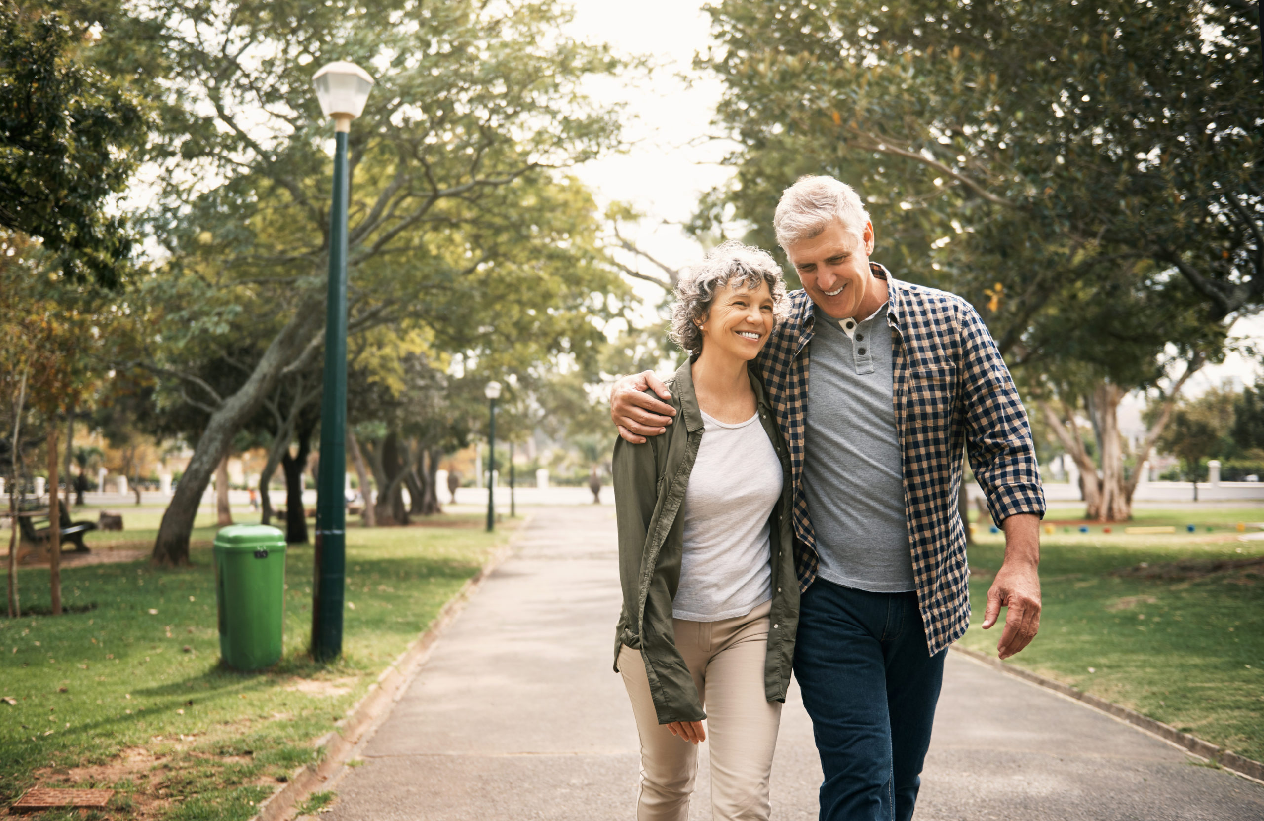 Shot of a happy senior couple going for a walk in the park