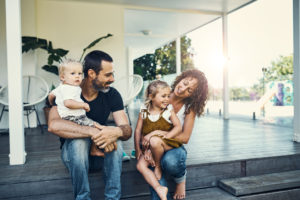 Shot of a happy young family spending the weekend together at home