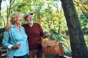 happy senior couple enjoying their day in nature