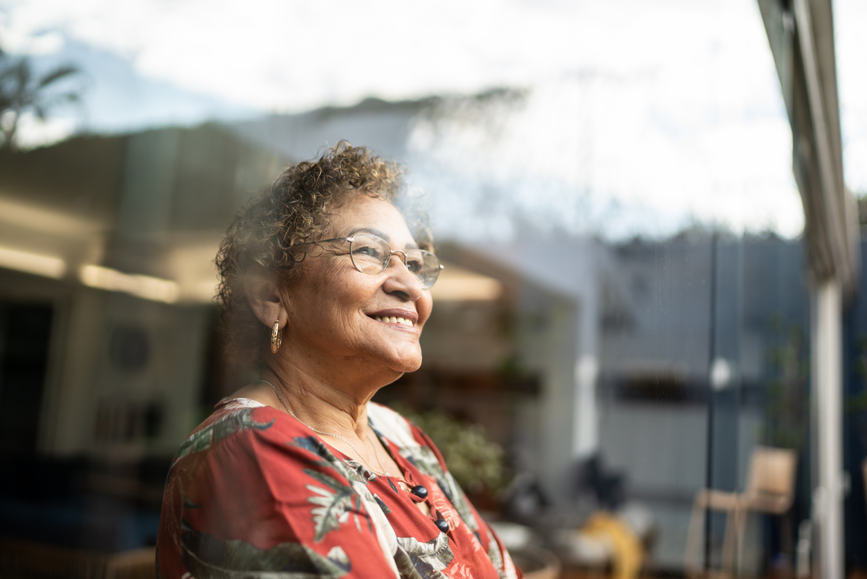 Senior woman contemplating at home