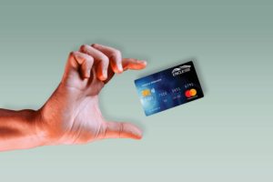 Hand reaching for credit card
