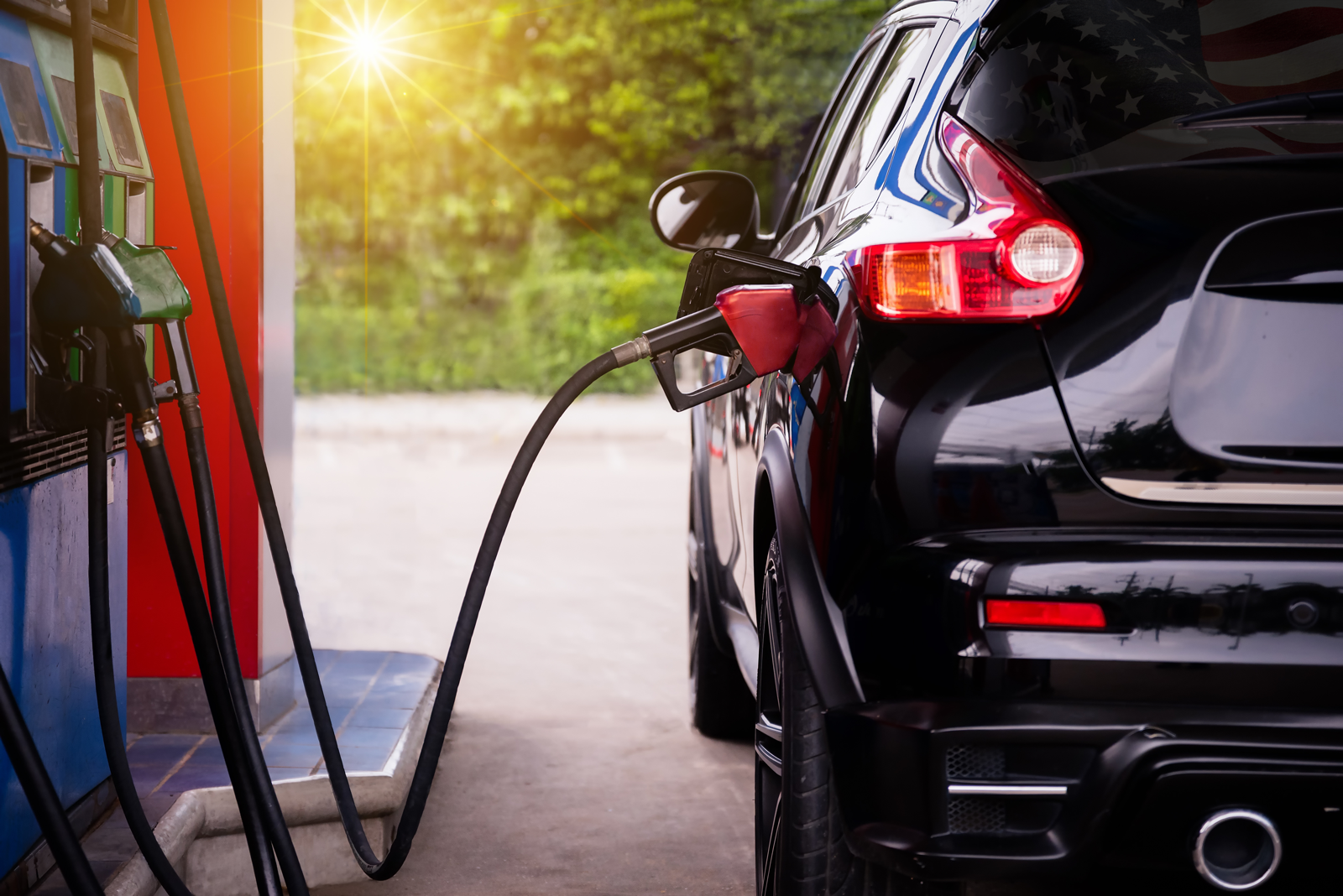 Car with gas pump in tank door