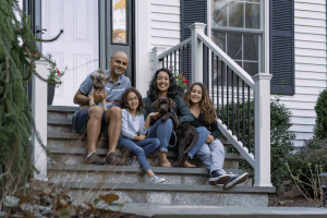 Family in front of their house