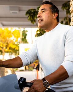 Mature Hispanic Man Filling Gas Tank