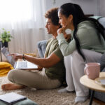 Millennial Couple Looking At Their Finances Via Online Banking