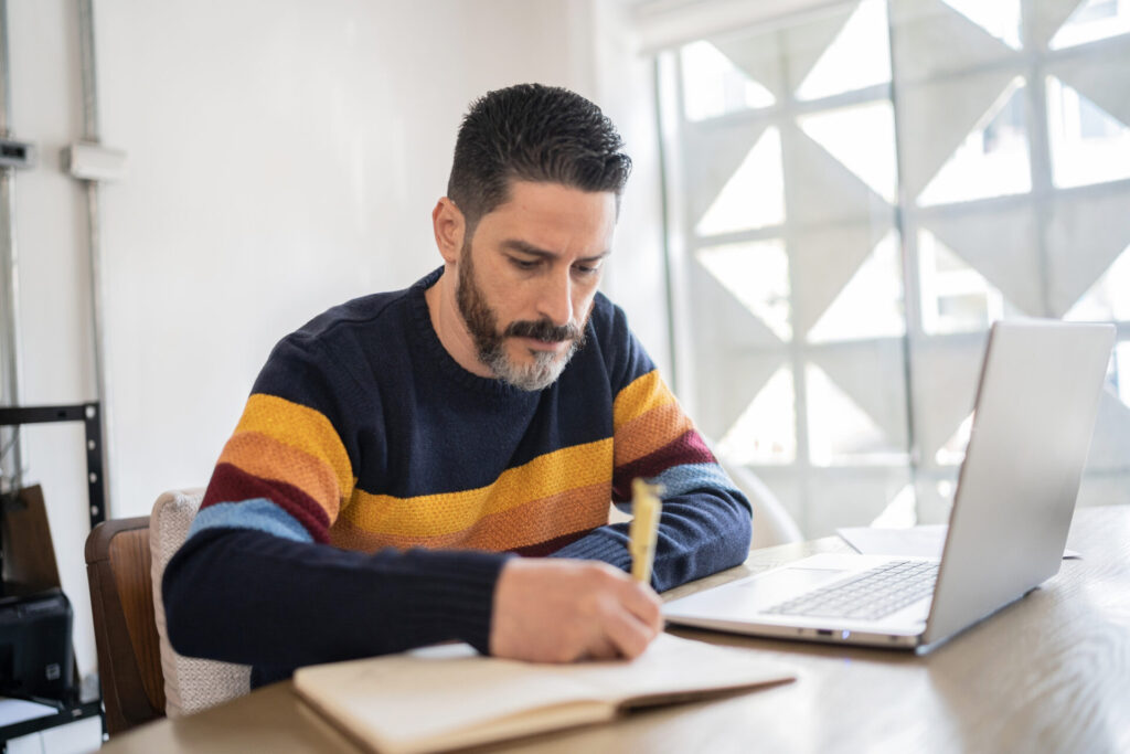 Mature Man Working At Home