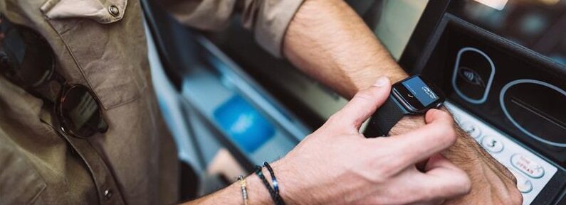Man Using Apple Watch To Access Cash At Atm Panorama