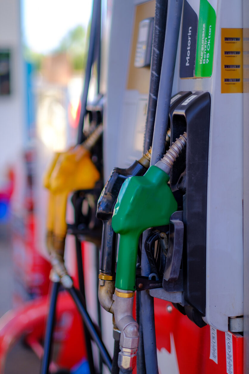 Fuel Filling Pump Car fueling at gas station. Refuel fill up with petrol gasoline. Petrol pump filling fuel nozzle in fuel tank of car at gas station. Petrol industry and service. Petrol price and oil crisis concept.