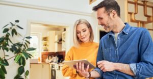 Couple using tablet.