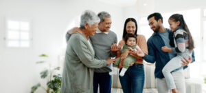 Generations, family and happy with toddler at home for gathering, visit and bonding