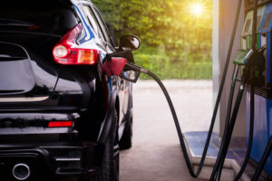 Image of a car at the gas station getting fuel.